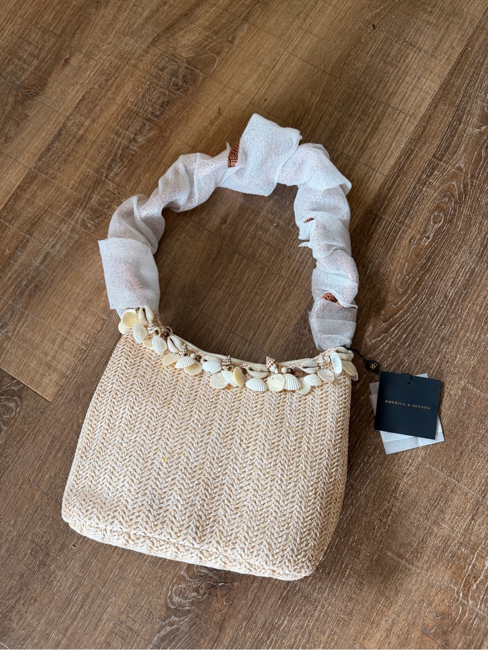 America and Beyond Shells and Sand Cream Woven Shell-Trim Shoulder Bag